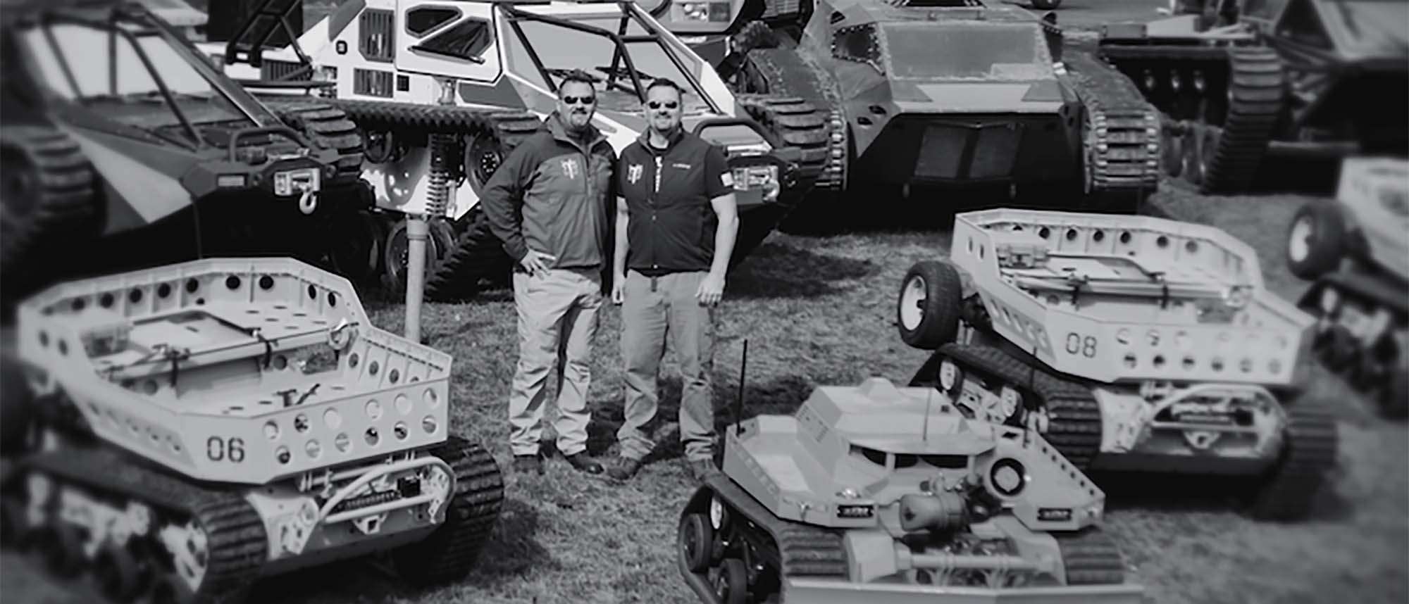 Howe Brothers surrounded by machines