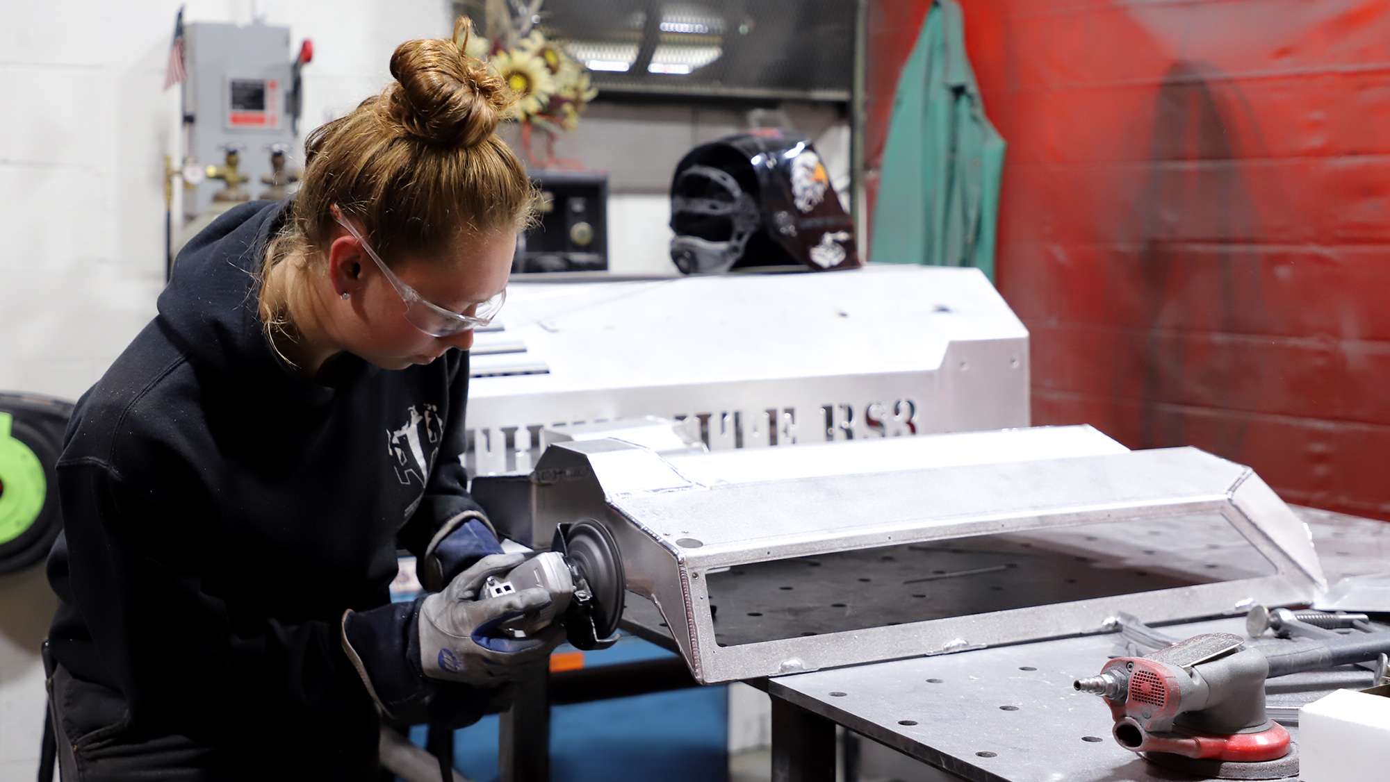 Woman working with a machine