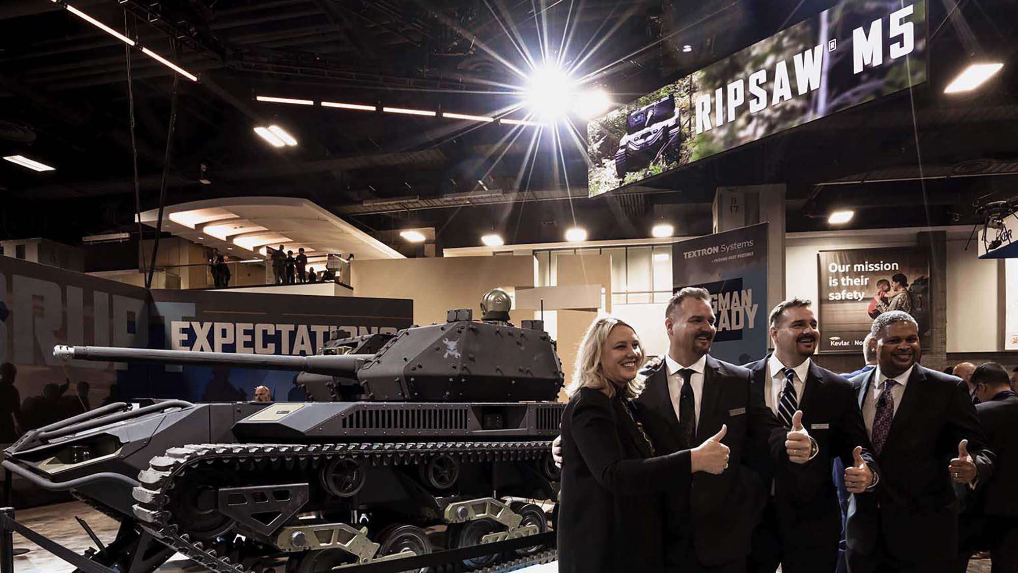 Ripsaw dream team in front of a ripsaw