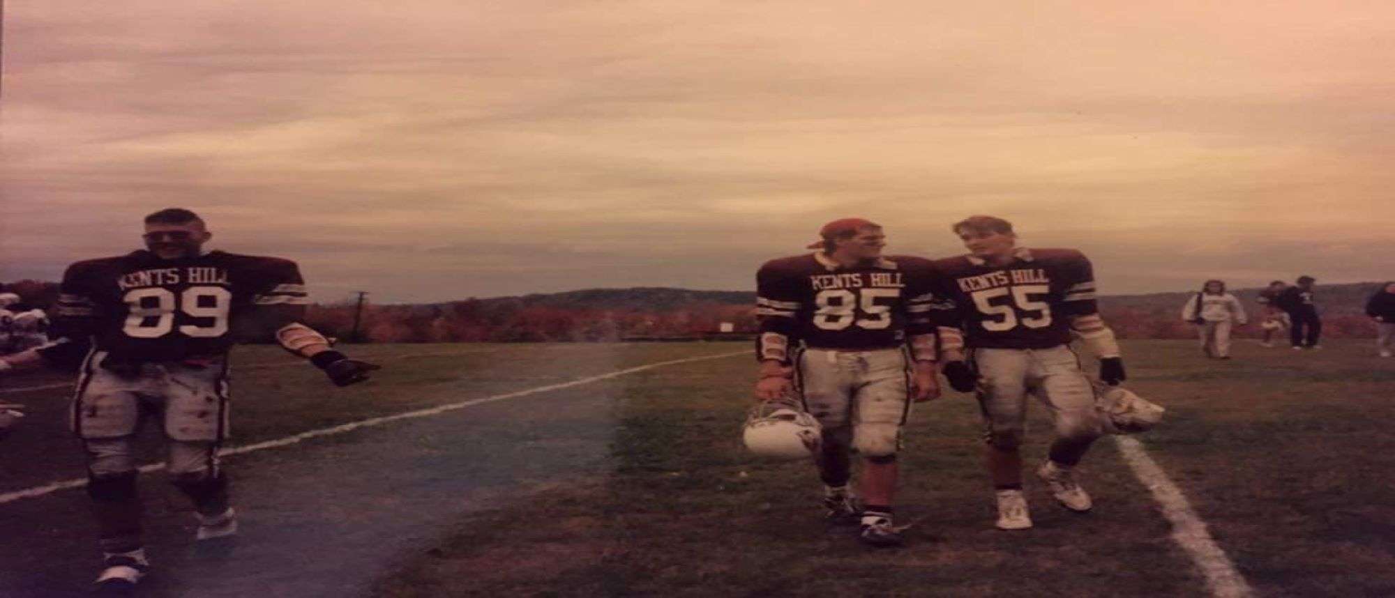 Howe brothers in football uniforms