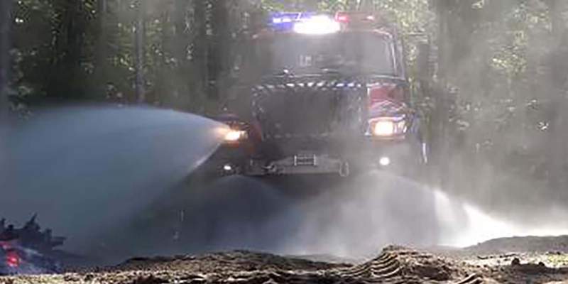 Thermite spraying water in woods